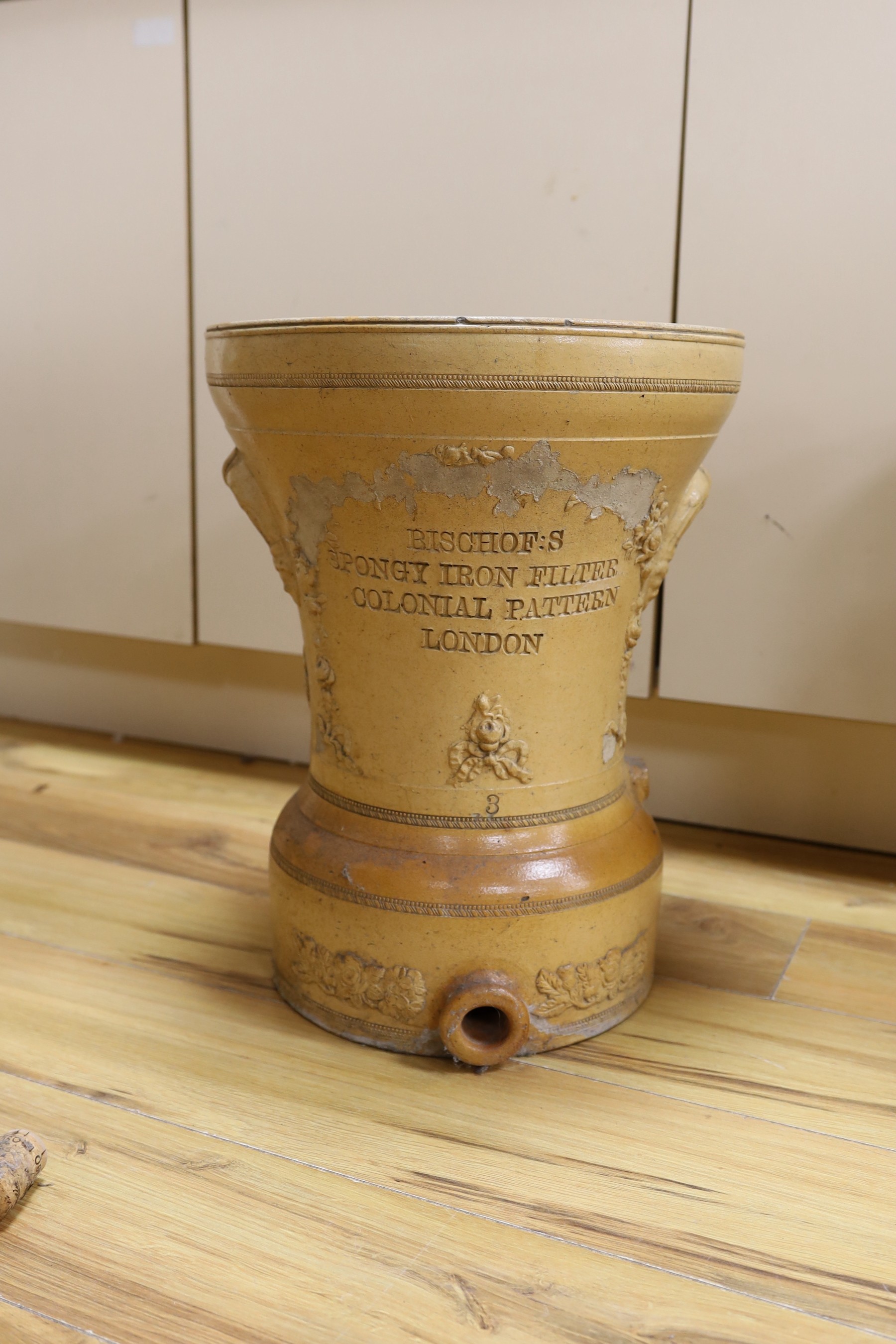 Barstow's of Ferrybridge patent natural stone and carbon water filter, together with a further filter, 47cms high